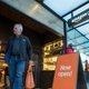 “A shopper walks out the the Amazon Go store, on January 22, 2018 in Seattle, Washington. After more than a year in beta Amazon opened the cashier-less store to the public.”